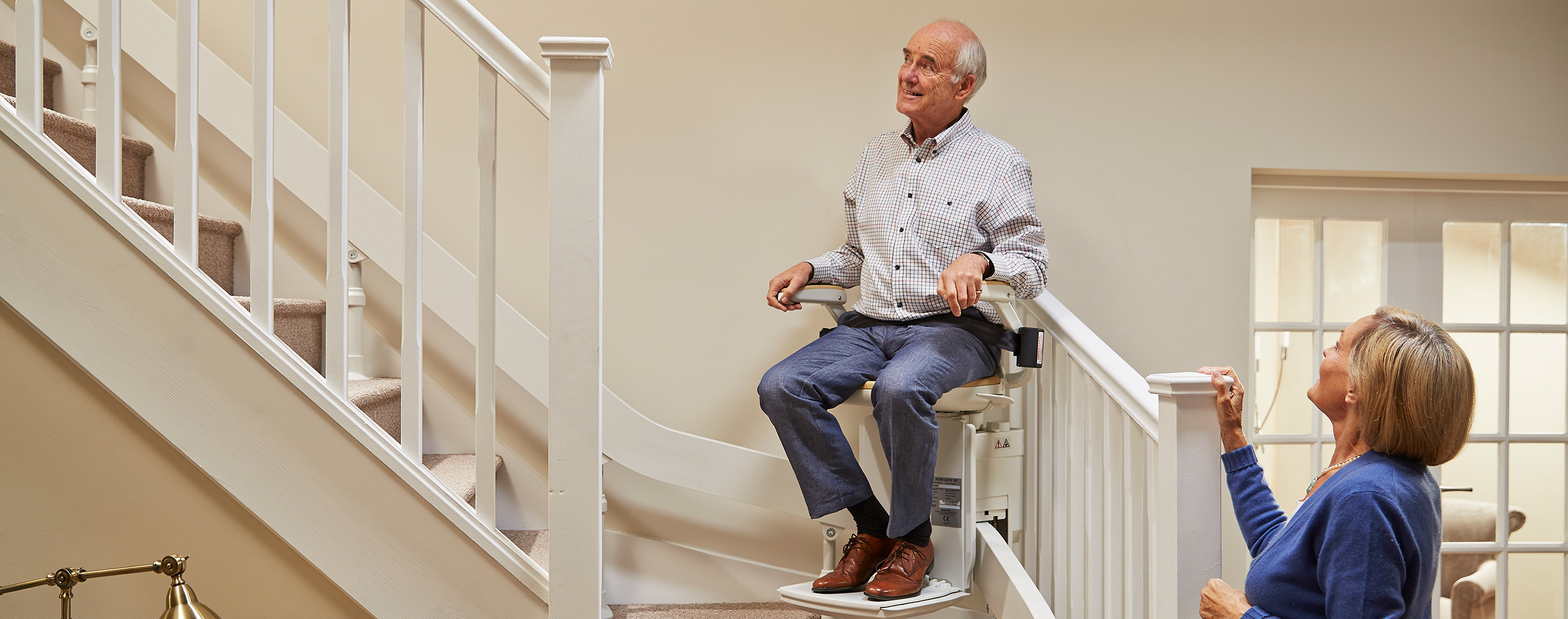 Man using a Acorn Stair lift