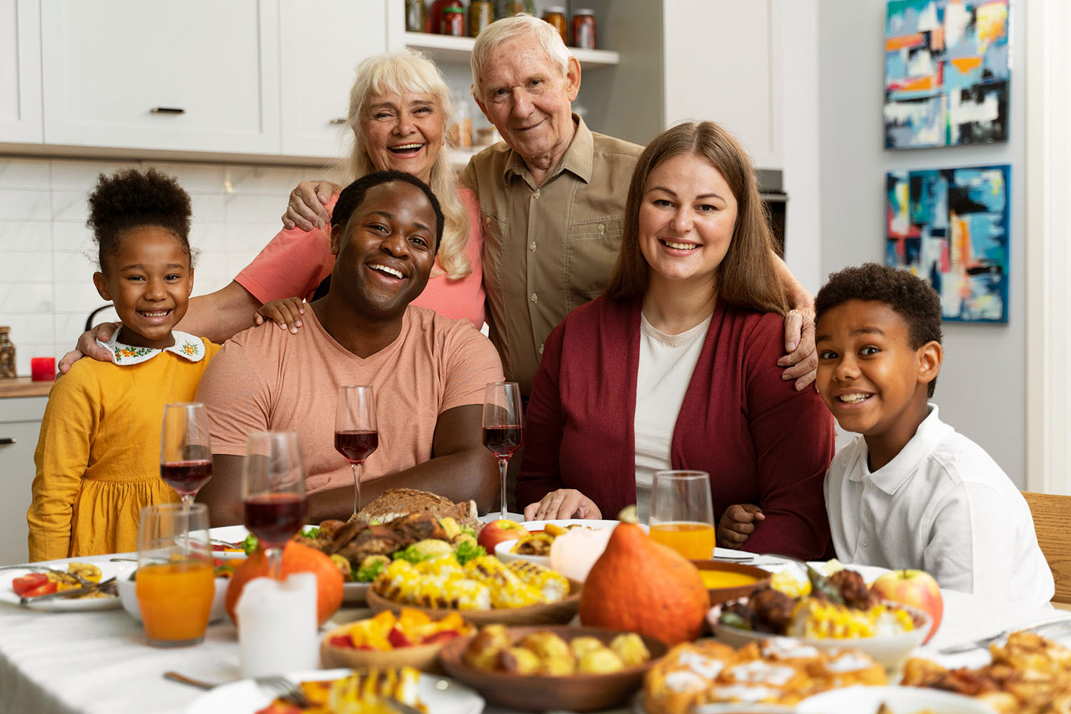 family at thanksgiving dinner table 